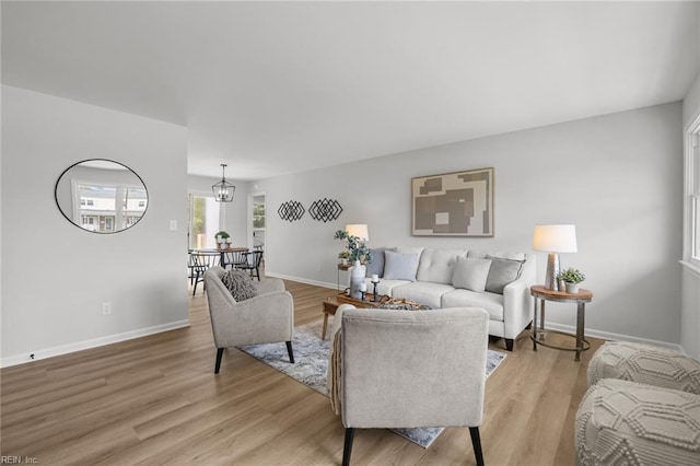 13 Cortez Ct, Hampton, VA 23666 - living room featuring light wood finished floors and baseboards
