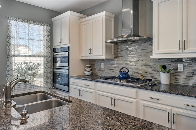 604 Baker Loop, Chesapeake, VA 23320 - kitchen featuring wall chimney range hood, a sink, stainless steel appliances, and white cabinets