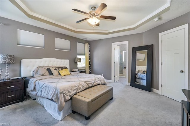 604 Baker Loop, Chesapeake, VA 23320 - bedroom with a tray ceiling, light colored carpet, crown molding, baseboards, and ensuite bath