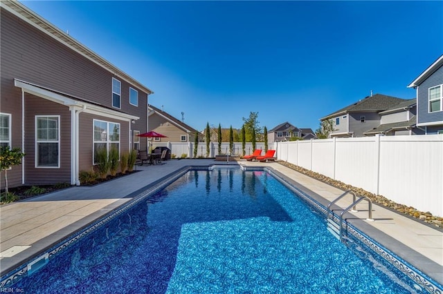 604 Baker Loop, Chesapeake, VA 23320 - view of pool featuring a patio area, a fenced backyard, and a residential view