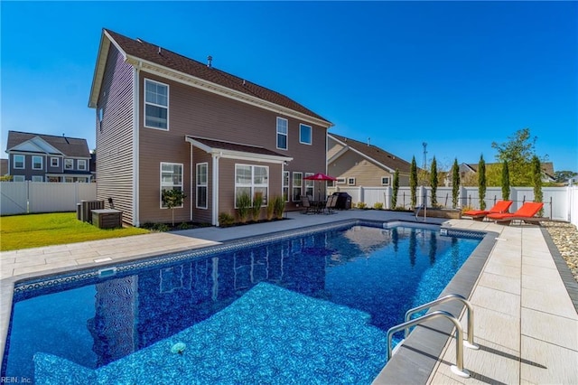 604 Baker Loop, Chesapeake, VA 23320 - view of swimming pool featuring a patio, a fenced backyard, a residential view, and central AC unit