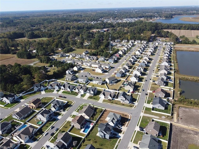 604 Baker Loop, Chesapeake, VA 23320 - aerial view of property and surrounding area featuring a large body of water, a forest, and nearby suburban area