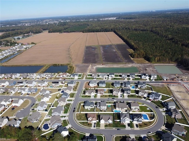 604 Baker Loop, Chesapeake, VA 23320 - aerial view of property's location featuring nearby suburban area, a nearby body of water, and a heavily wooded area