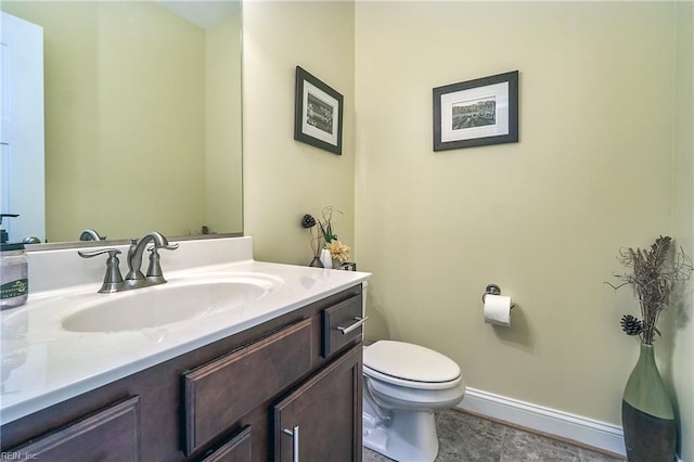 604 Baker Loop, Chesapeake, VA 23320 - bathroom with vanity, toilet, and baseboards