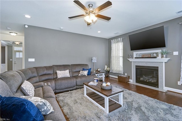 604 Baker Loop, Chesapeake, VA 23320 - living area featuring ceiling fan, wood finished floors, recessed lighting, a fireplace with flush hearth, and baseboards