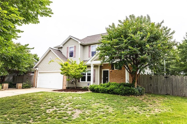 2408 Raynor Ct, Virginia Beach, VA 23456 - view of front of home with driveway, brick siding, and an attached garage