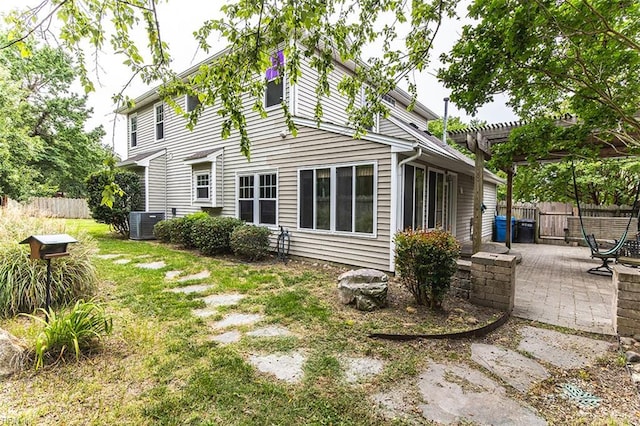 2408 Raynor Ct, Virginia Beach, VA 23456 - rear view of property featuring a patio, a pergola, and central air condition unit