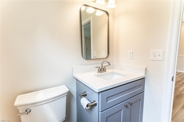 2408 Raynor Ct, Virginia Beach, VA 23456 - bathroom featuring vanity, toilet, and wood finished floors