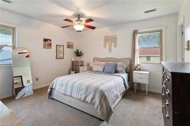 1032 Kincaid Ter, Chesapeake, VA 23320 - bedroom with light carpet, multiple windows, and baseboards