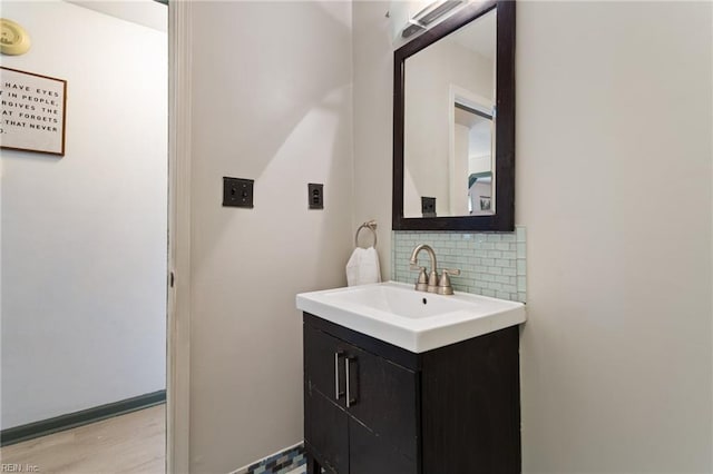 1032 Kincaid Ter, Chesapeake, VA 23320 - bathroom with decorative backsplash, vanity, and wood finished floors