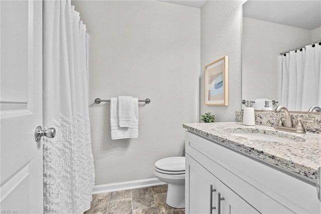 209 Apple Ct, Elizabeth City, NC 27909 - bathroom featuring vanity, toilet, baseboards, and curtained shower