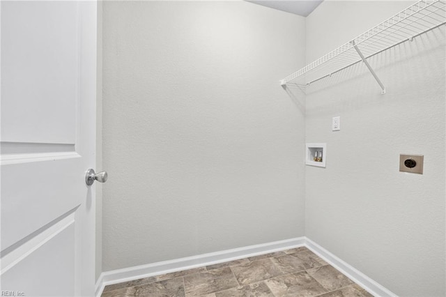 209 Apple Ct, Elizabeth City, NC 27909 - laundry room with hookup for an electric dryer, washer hookup, baseboards, and stone finish floors