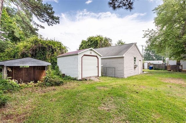 795 Old Oyster Point Rd, Newport News, VA 23602 - garage featuring a storage unit
