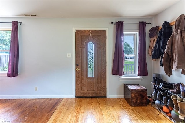 795 Old Oyster Point Rd, Newport News, VA 23602 - foyer entrance with wood finished floors and healthy amount of natural light