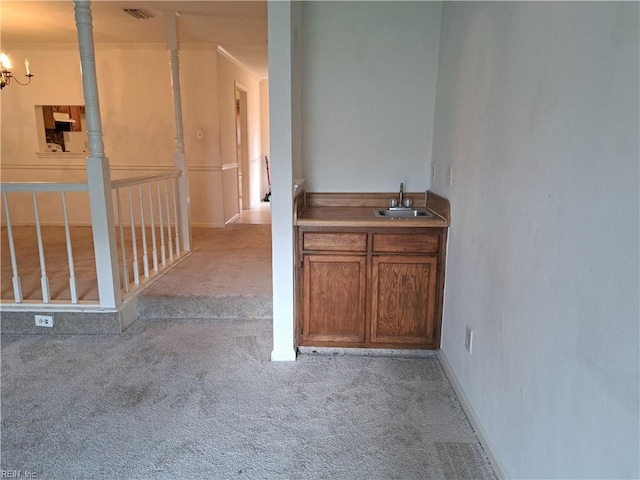 5529 Baccalaureate Dr, Virginia Beach, VA 23462 - hallway featuring carpet floors, a sink, and a chandelier