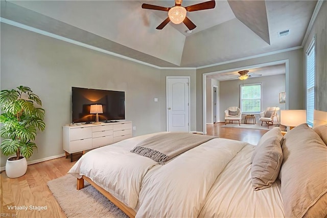 204 Goshawk Ct, Suffolk, VA 23435 - bedroom with light wood-style floors, a tray ceiling, ceiling fan, ornamental molding, and baseboards