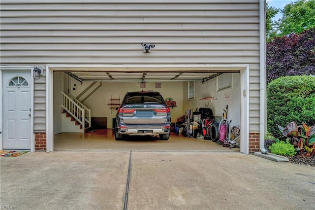 204 Goshawk Ct, Suffolk, VA 23435 - garage featuring driveway