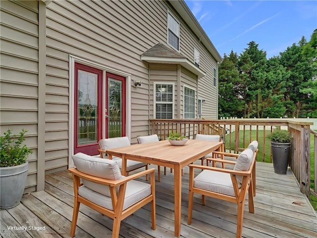 204 Goshawk Ct, Suffolk, VA 23435 - wooden deck with outdoor dining area