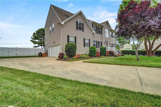 204 Goshawk Ct, Suffolk, VA 23435 - view of front facade featuring a garage and concrete driveway
