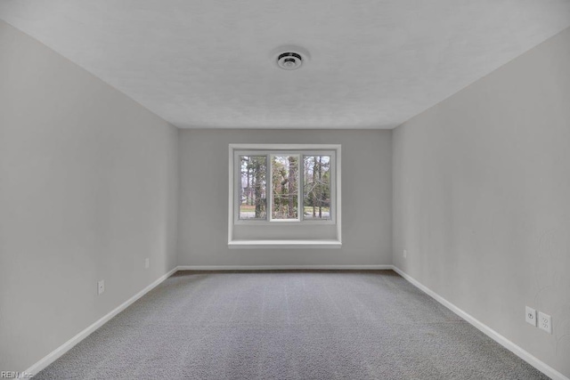 376 Merrimac Trl Unit 113, Williamsburg, VA 23185 - carpeted spare room with baseboards