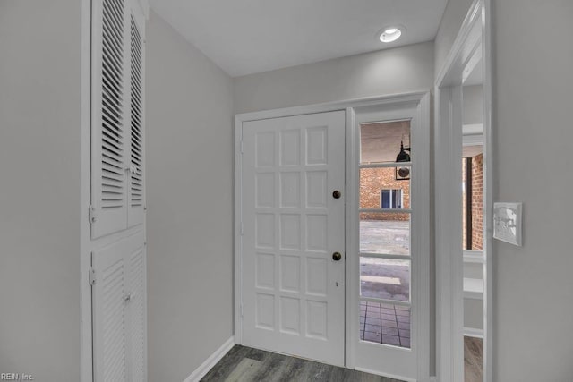 376 Merrimac Trl Unit 113, Williamsburg, VA 23185 - entryway with dark wood finished floors and baseboards