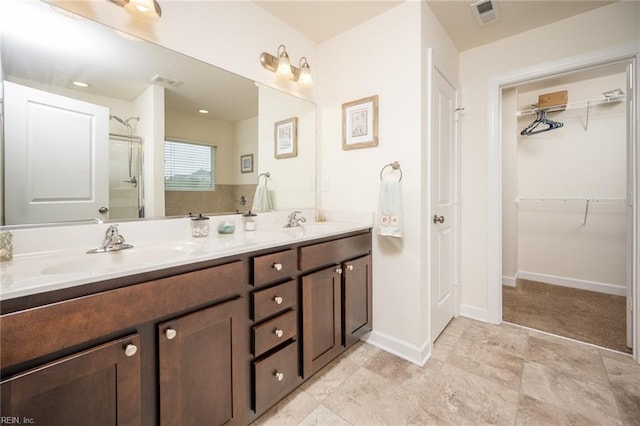 471 Abelia Way, Chesapeake, VA 23322 - full bathroom featuring double vanity, a shower with door, and a walk in closet