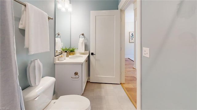 909 Jennings Ln, Chesapeake, VA 23322 - bathroom featuring vanity, toilet, and tile patterned floors