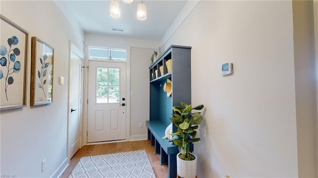 909 Jennings Ln, Chesapeake, VA 23322 - doorway to outside featuring light wood finished floors and baseboards