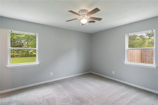 2816 N Nansemond Dr, Suffolk, VA 23435 - unfurnished room featuring plenty of natural light, carpet flooring, and ceiling fan