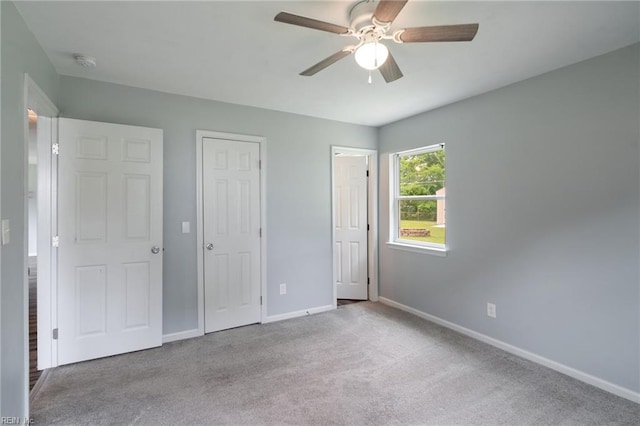 2816 N Nansemond Dr, Suffolk, VA 23435 - unfurnished bedroom with carpet flooring, baseboards, and ceiling fan