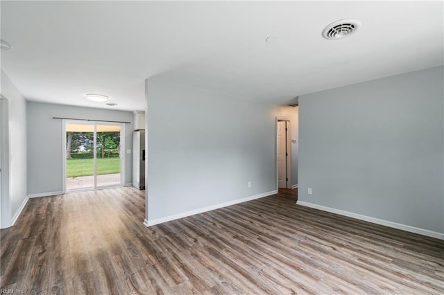 2816 N Nansemond Dr, Suffolk, VA 23435 - spare room featuring wood finished floors and baseboards