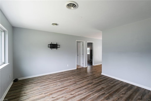 2816 N Nansemond Dr, Suffolk, VA 23435 - unfurnished room featuring dark wood-style floors and baseboards