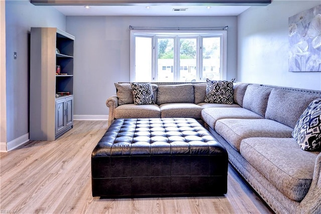 115 Bowen Dr, Hampton, VA 23666 - living room featuring light wood-style floors and recessed lighting