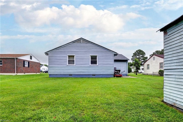 115 Bowen Dr, Hampton, VA 23666 - back of property featuring crawl space and a yard