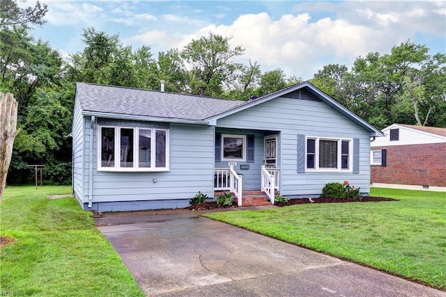 115 Bowen Dr, Hampton, VA 23666 - view of front of house featuring a front lawn, a shingled roof, and covered porch