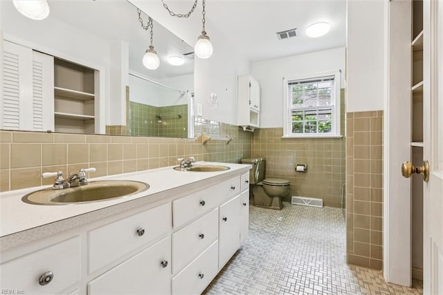 122 Avery Cres, Newport News, VA 23606 - full bath with tile walls, double vanity, toilet, tiled shower, and tile patterned floors