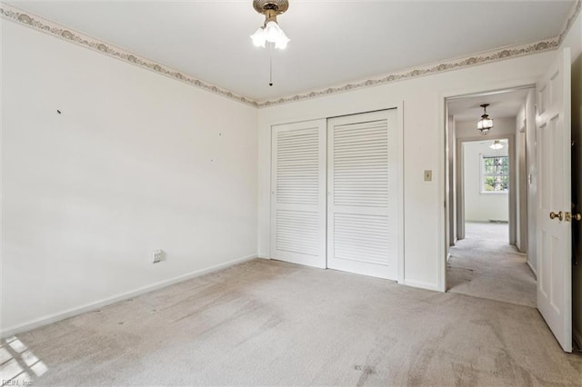 122 Avery Cres, Newport News, VA 23606 - unfurnished bedroom with light colored carpet, a closet, and baseboards