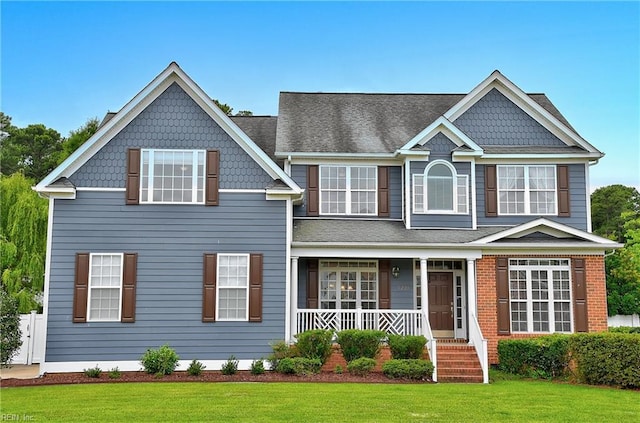 1228 Cherrytree Ln, Chesapeake, VA 23320 - view of front of home featuring covered porch and a front yard