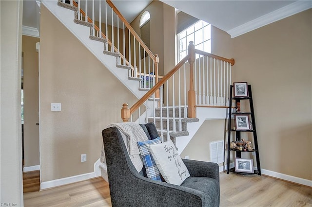 1228 Cherrytree Ln, Chesapeake, VA 23320 - staircase featuring wood finished floors, ornamental molding, and baseboards