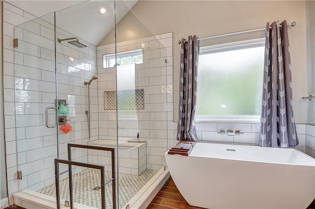 1228 Cherrytree Ln, Chesapeake, VA 23320 - full bathroom with tile walls, a freestanding bath, a shower stall, wood finished floors, and lofted ceiling