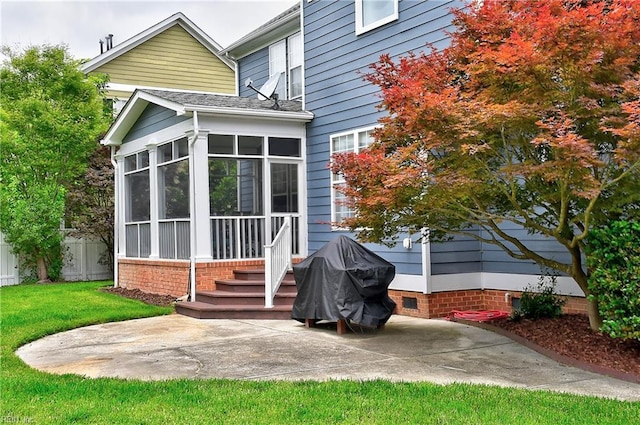 1228 Cherrytree Ln, Chesapeake, VA 23320 - rear view of property featuring a sunroom and a patio area