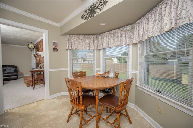 905 Lela Ln, Chesapeake, VA 23322 - dining space featuring ornamental molding, light carpet, light tile patterned floors, and a brick fireplace