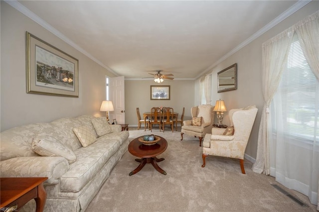 905 Lela Ln, Chesapeake, VA 23322 - carpeted living area featuring a ceiling fan and crown molding