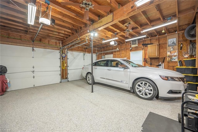 905 Lela Ln, Chesapeake, VA 23322 - garage with a garage door opener and a ceiling fan