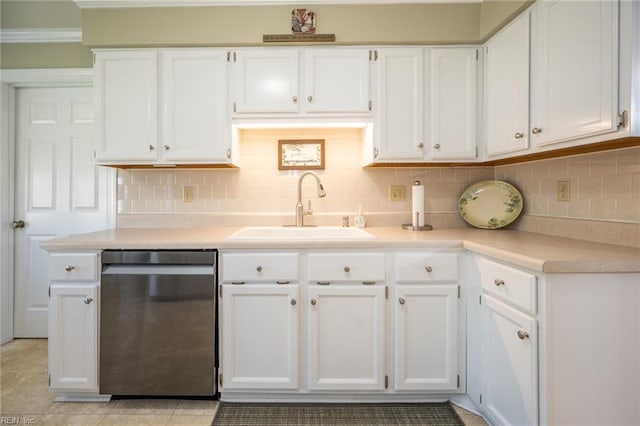 905 Lela Ln, Chesapeake, VA 23322 - kitchen with stainless steel dishwasher, white cabinets, light countertops, and tasteful backsplash