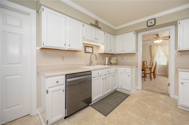 905 Lela Ln, Chesapeake, VA 23322 - kitchen featuring dishwasher, light countertops, white cabinetry, and ornamental molding