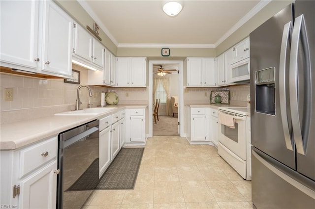 905 Lela Ln, Chesapeake, VA 23322 - kitchen with stainless steel appliances, white cabinetry, light countertops, crown molding, and a ceiling fan