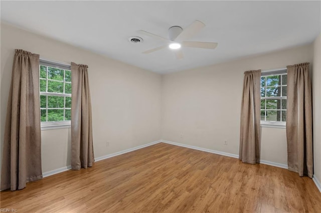 10 Kathy Dr, Poquoson, VA 23662 - spare room featuring ceiling fan, light wood finished floors, plenty of natural light, and baseboards
