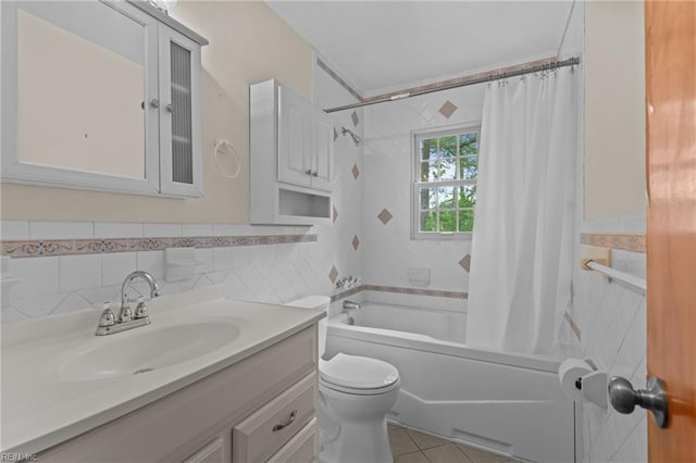 10 Kathy Dr, Poquoson, VA 23662 - bathroom featuring tile walls, vanity, shower / bath combo with shower curtain, toilet, and tile patterned floors