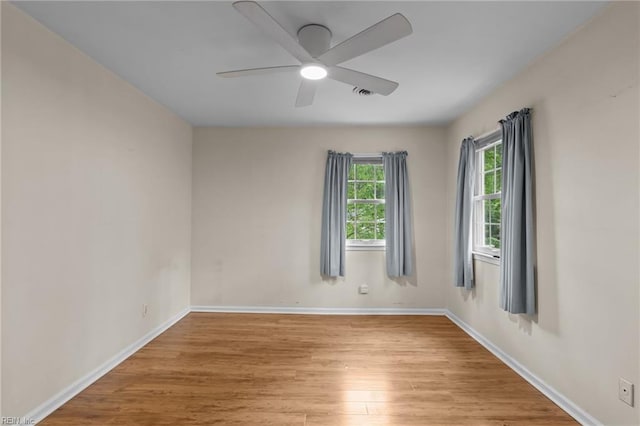 10 Kathy Dr, Poquoson, VA 23662 - empty room with wood finished floors, baseboards, and a ceiling fan